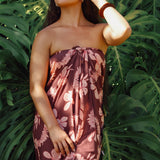 woman wearing pareo with awapuhi print