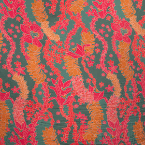 a colorful pareo with tropical lei print
