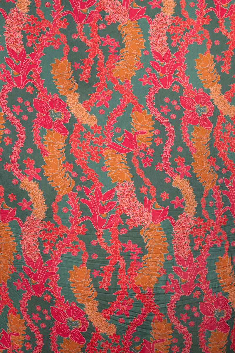 a colorful pareo with tropical lei print