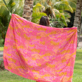 Bright pink pareo with lei pattern 