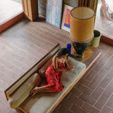 woman wearing retro pareo with vibrant pink pua pattern