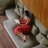 woman wearing retro pareo with vibrant pink pua pattern