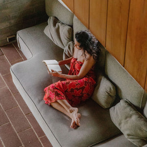 woman wearing retro pareo with vibrant pink pua pattern