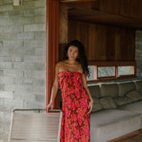 woman wearing retro pareo with vibrant pink pua pattern