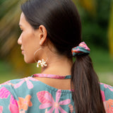 woman wearing scrunchie in floral pattern