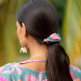 woman wearing scrunchie in floral pattern