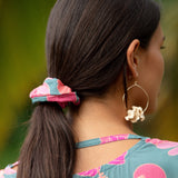 woman wearing scrunchie in floral pattern