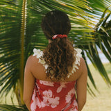 woman wearing red scrunchie with pink ginger print