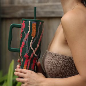 green tumbler with shell lei print