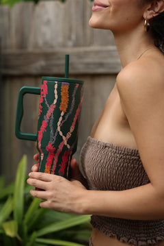 green tumbler with shell lei print