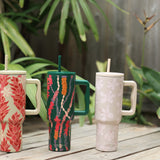 tan tumbler with kokio print