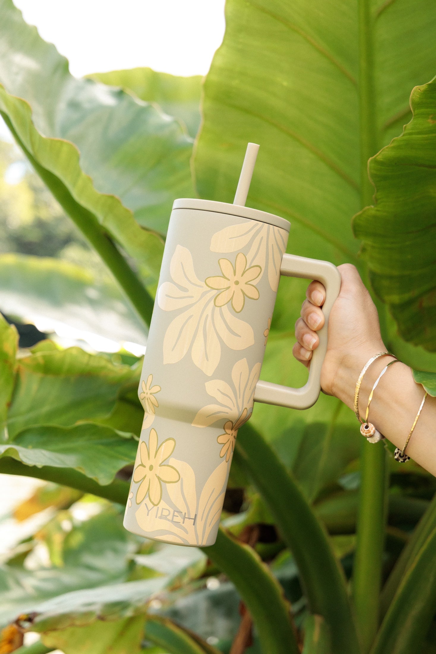 40 oz tumbler with naupaka and tiare print