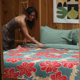 woven cotton blanket in lei pua green