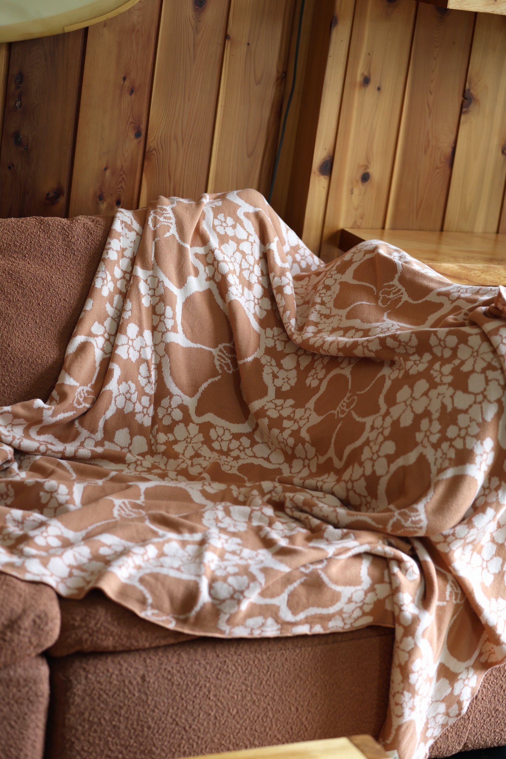 woven cotton blanket in pua paina tan