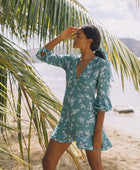 The Yireh Aster Dress in Lagoon. Romantic and feminine silhouette. This is a classic Yireh style featuring flowing sleeves with a tie at the wrist and a zipper closure in back. One of kind and exclusive Yireh print. Ethically and sustainably made resort wear.
