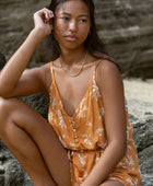 YIREH Hudson Romper in Spice - a flirty romper with covered buttons, adjustable straps, and a tie belt. Versatile resortwear ethically and sustainably made with exclusive and one of a kind prints.