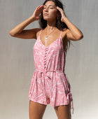 YIREH Hudson Romper in Petal - a flirty romper with covered buttons, adjustable straps, and a tie belt. Versatile resortwear ethically and sustainably made with exclusive and one of a kind prints.